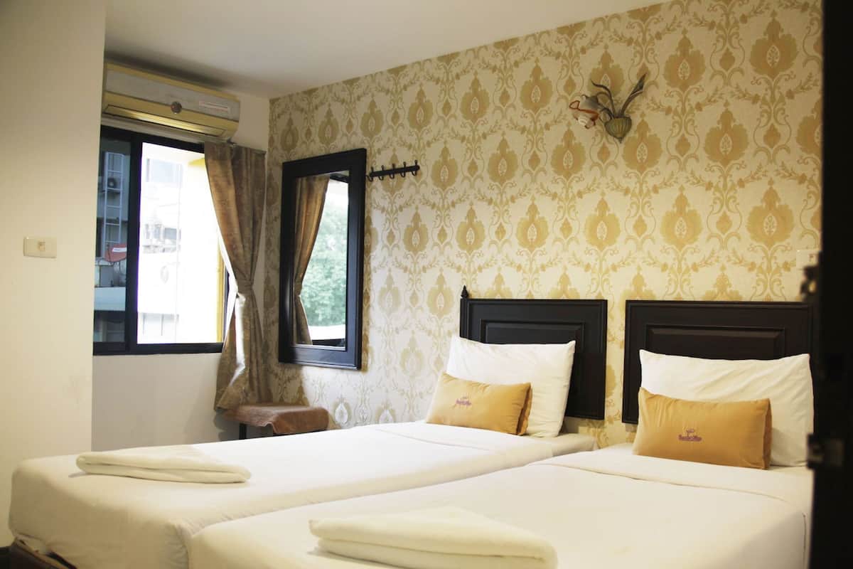 In-room safe, individually decorated, blackout curtains, rollaway beds
