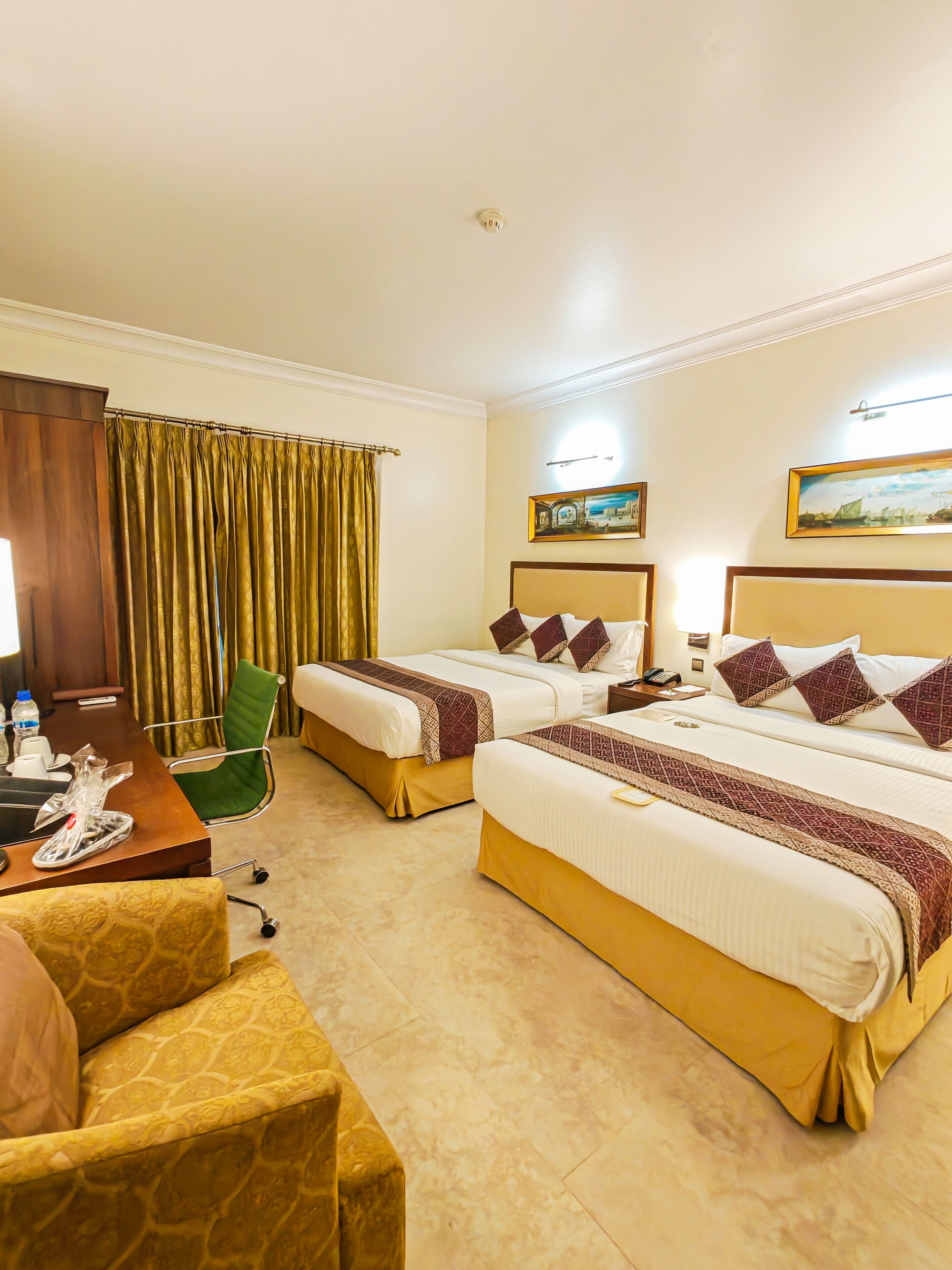 Queen Queen Room | Premium bedding, minibar, in-room safe, individually decorated