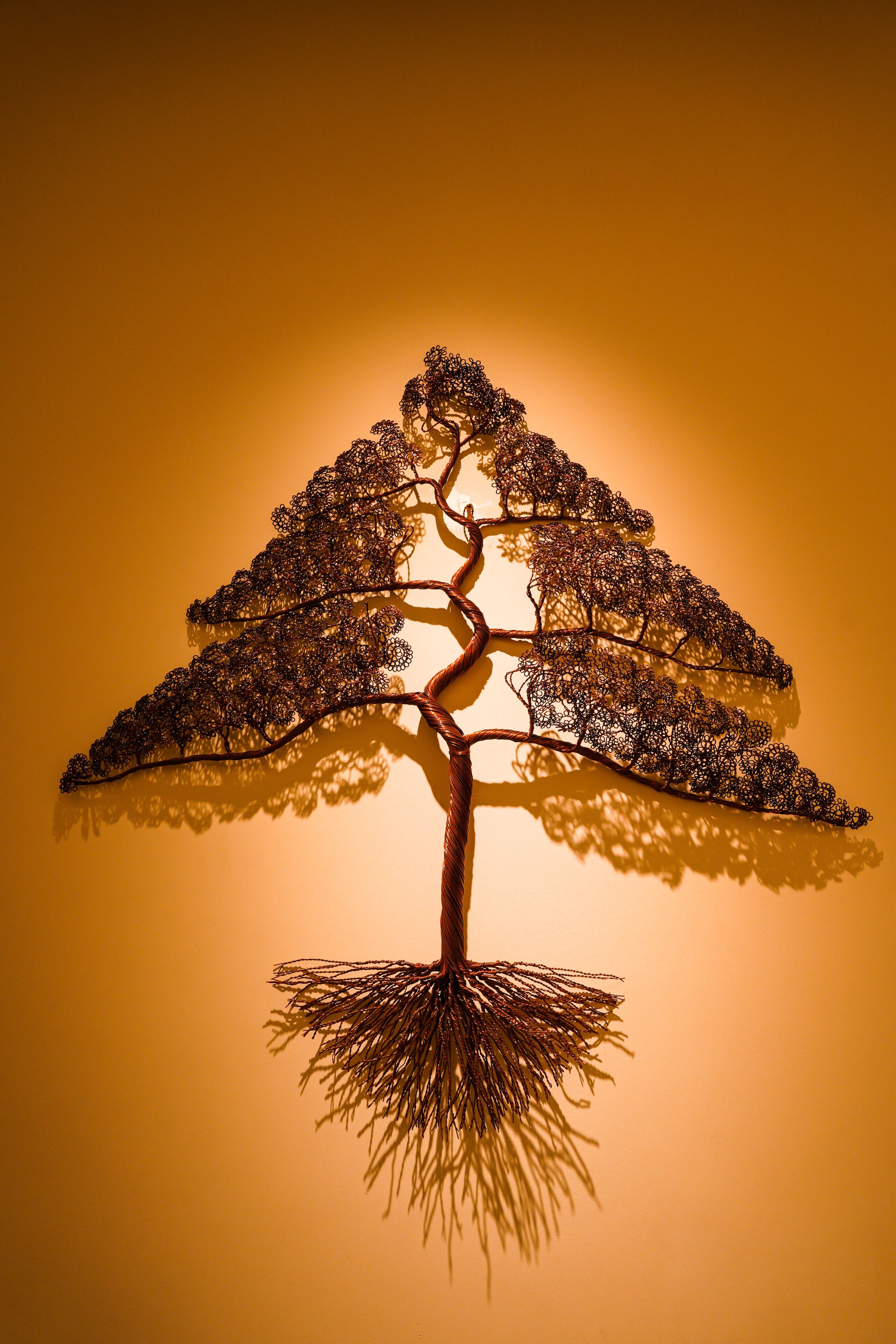 A sculpture of a tree with intricate branches and a detailed trunk.