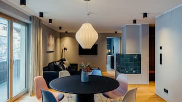 Deluxe Apartment | Living area | Flat-screen TV, fireplace