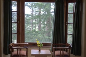 デラックス ダブルルーム | 客室内のダイニングエリア