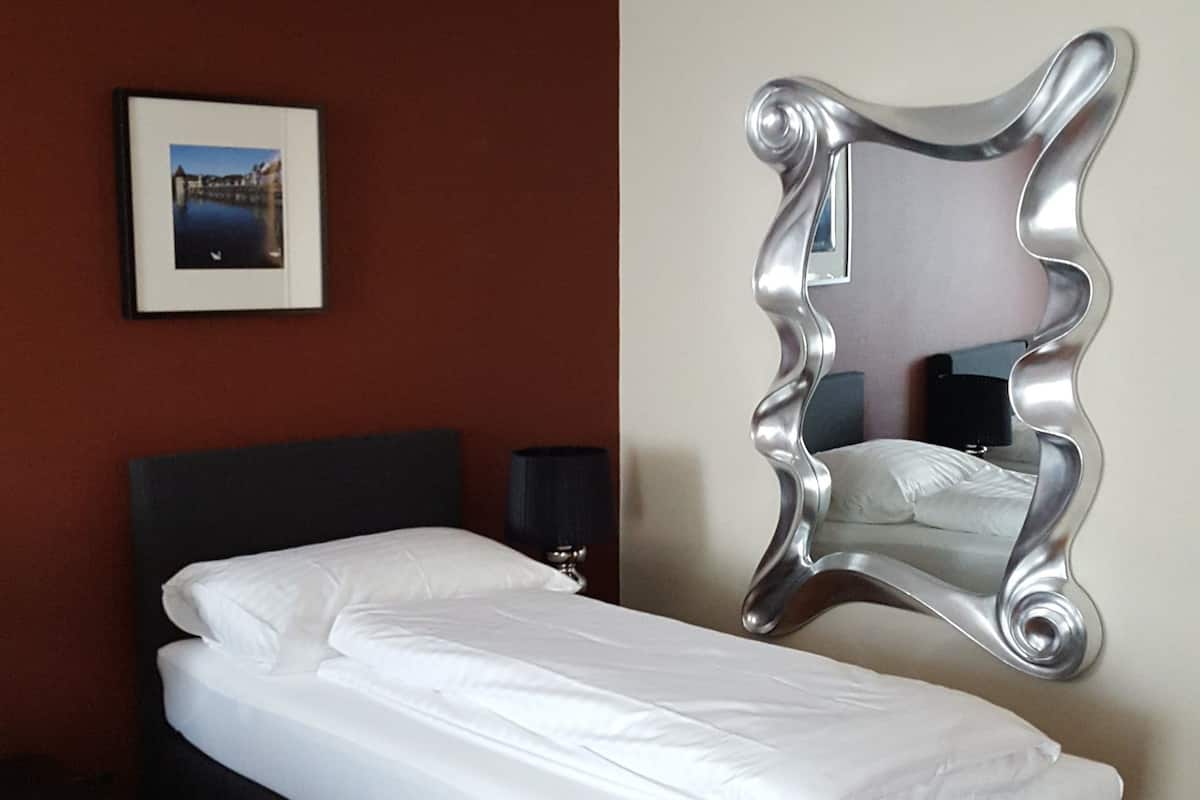 Triple Room | Desk, blackout drapes, cribs (surcharge), rollaway beds (surcharge)