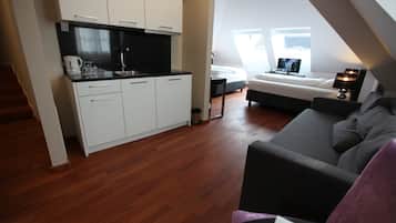 Standard Quadruple Room, Kitchenette | Desk, blackout drapes, cribs/infant beds, rollaway beds
