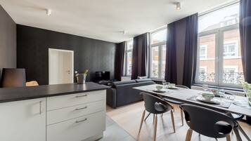 Apartment, 1 Bedroom | Living area | Flat-screen TV