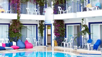 Seasonal outdoor pool, pool umbrellas, sun loungers