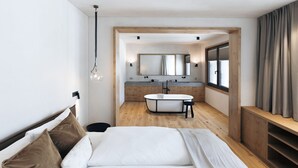 Un dormitorio moderno con una cama grande, cabecera de madera, mesita de noche y un banco empotrado.