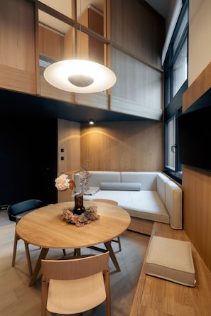 Duplex Studio | Living area | 40-inch flat-screen TV with cable channels, TV - Andermatt Alpine Apartments (Andermatt)