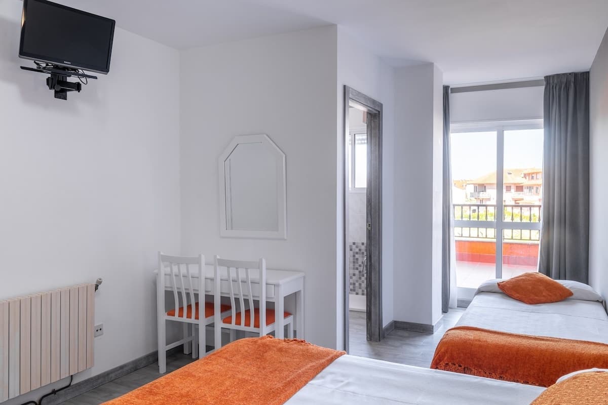 triple room, terrace | in-room safe, desk, blackout curtains, free wifi