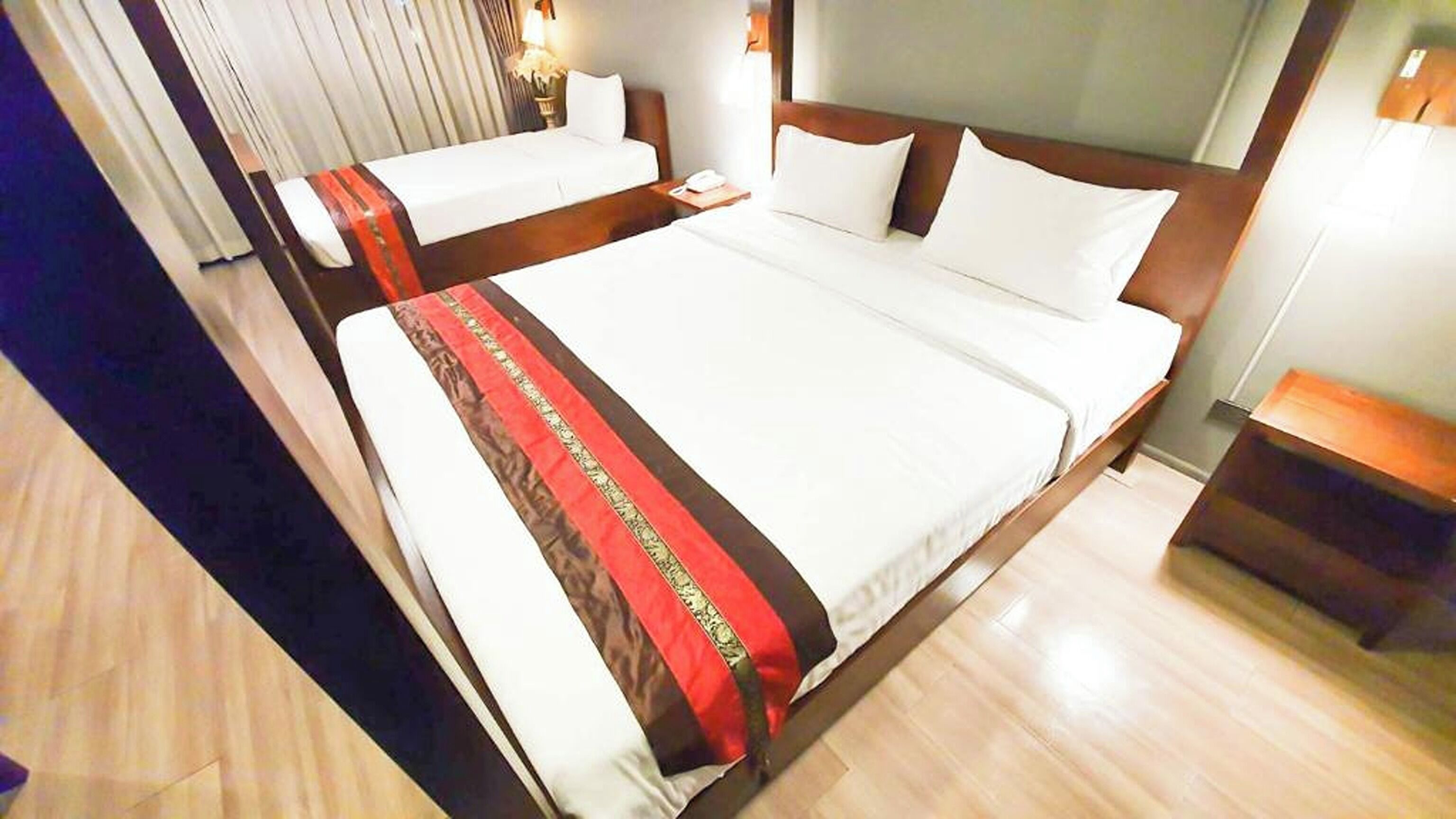 Family Room | In-room safe, individually decorated, desk, rollaway beds