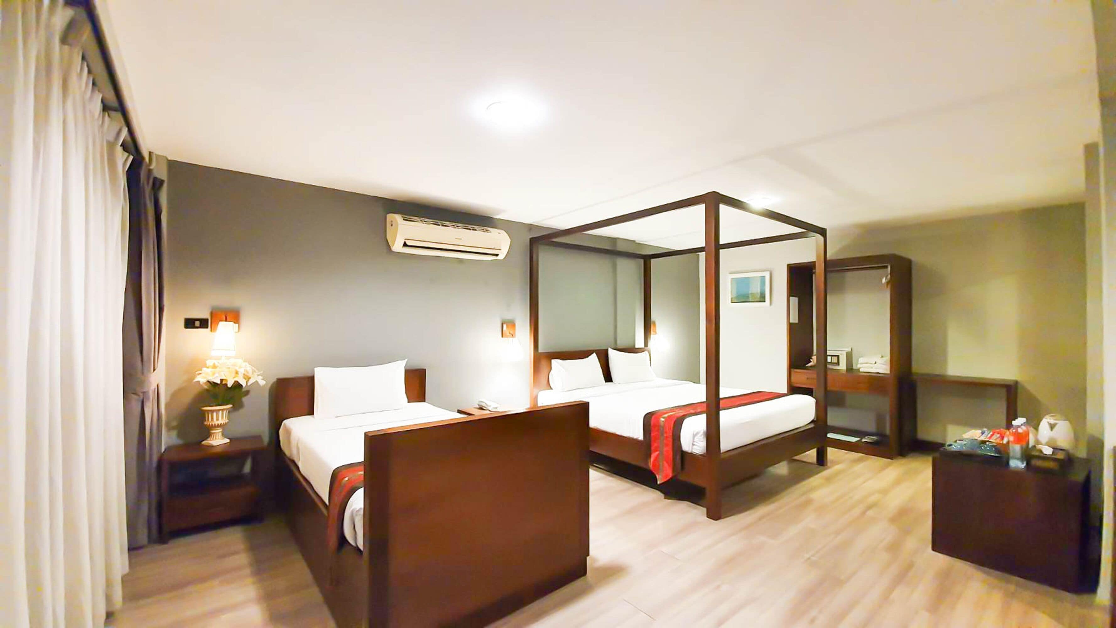 family room, balcony | 1 bedroom, in-room safe, individually decorated, desk