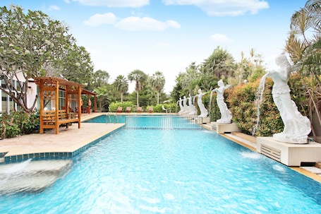 2 outdoor pools, open 7:00 AM to 7:00 PM, pool umbrellas, sun loungers