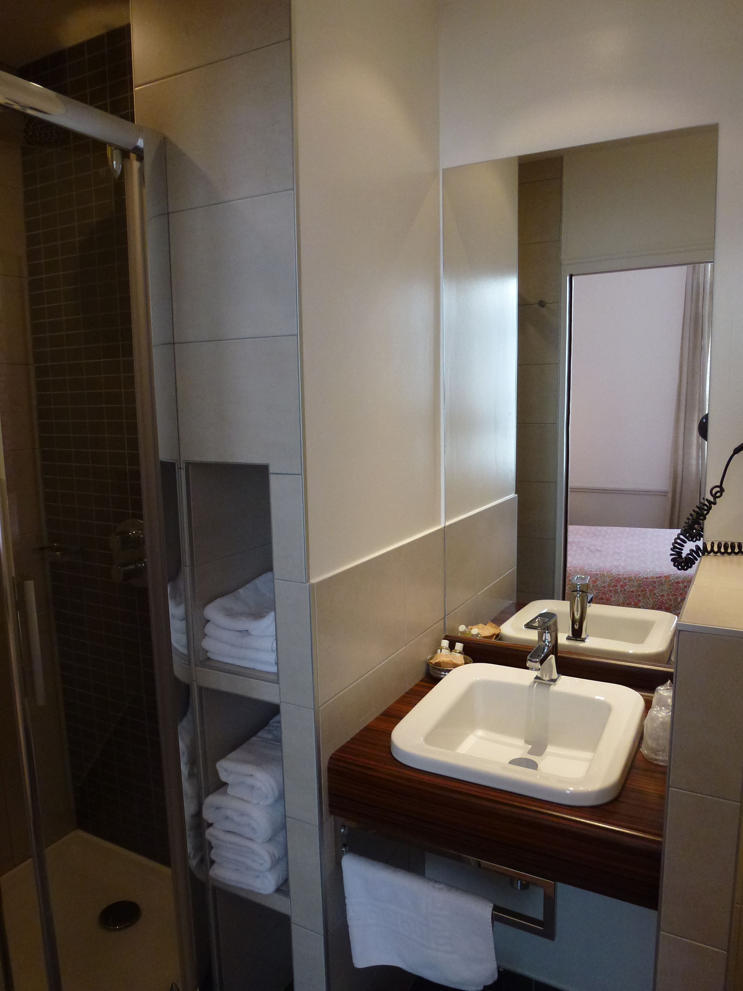 family room | bathroom | shower, rainfall showerhead, free toiletries, hair dryer