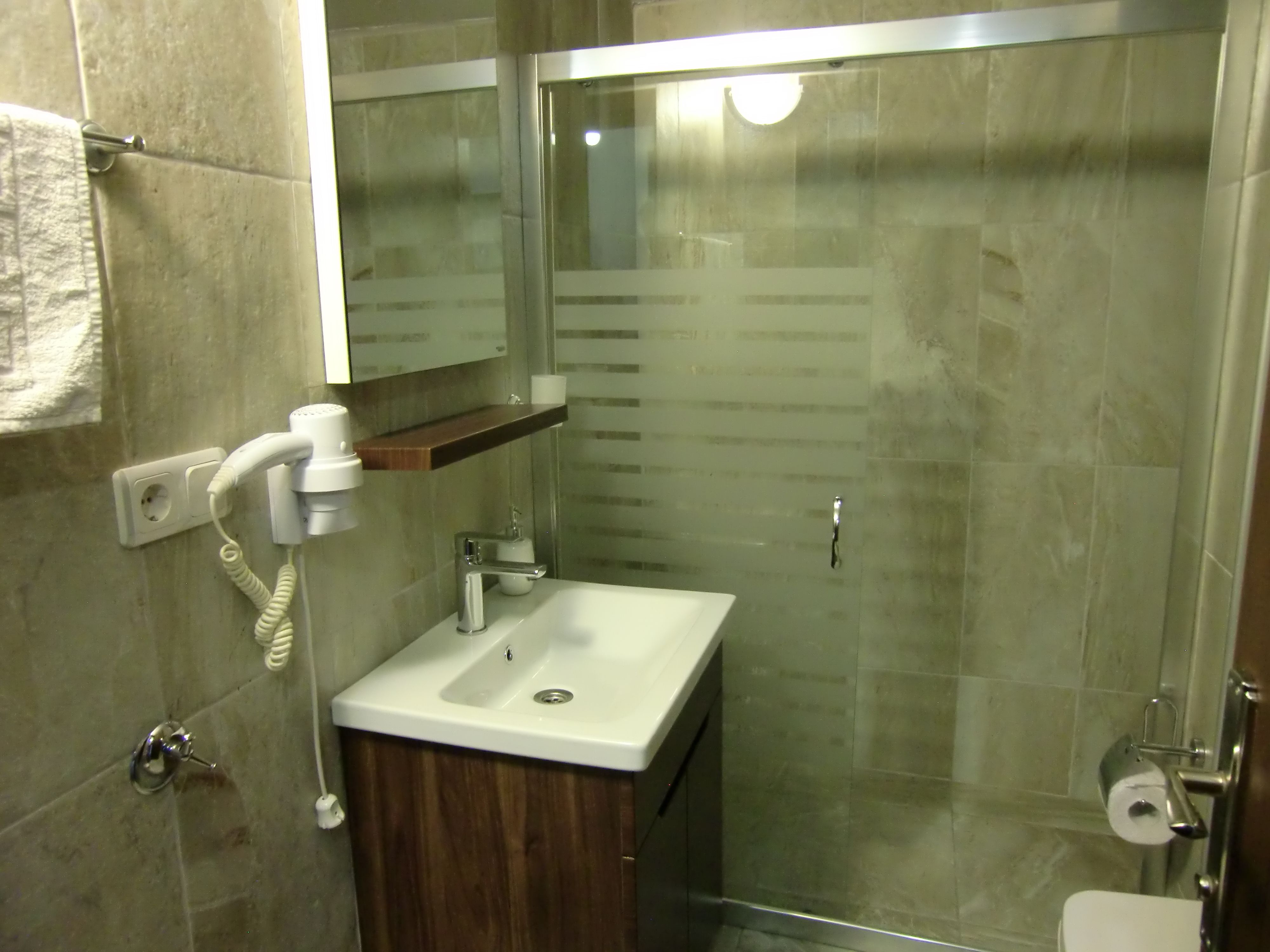 comfort room | bathroom | shower, free toiletries, hair dryer, slippers
