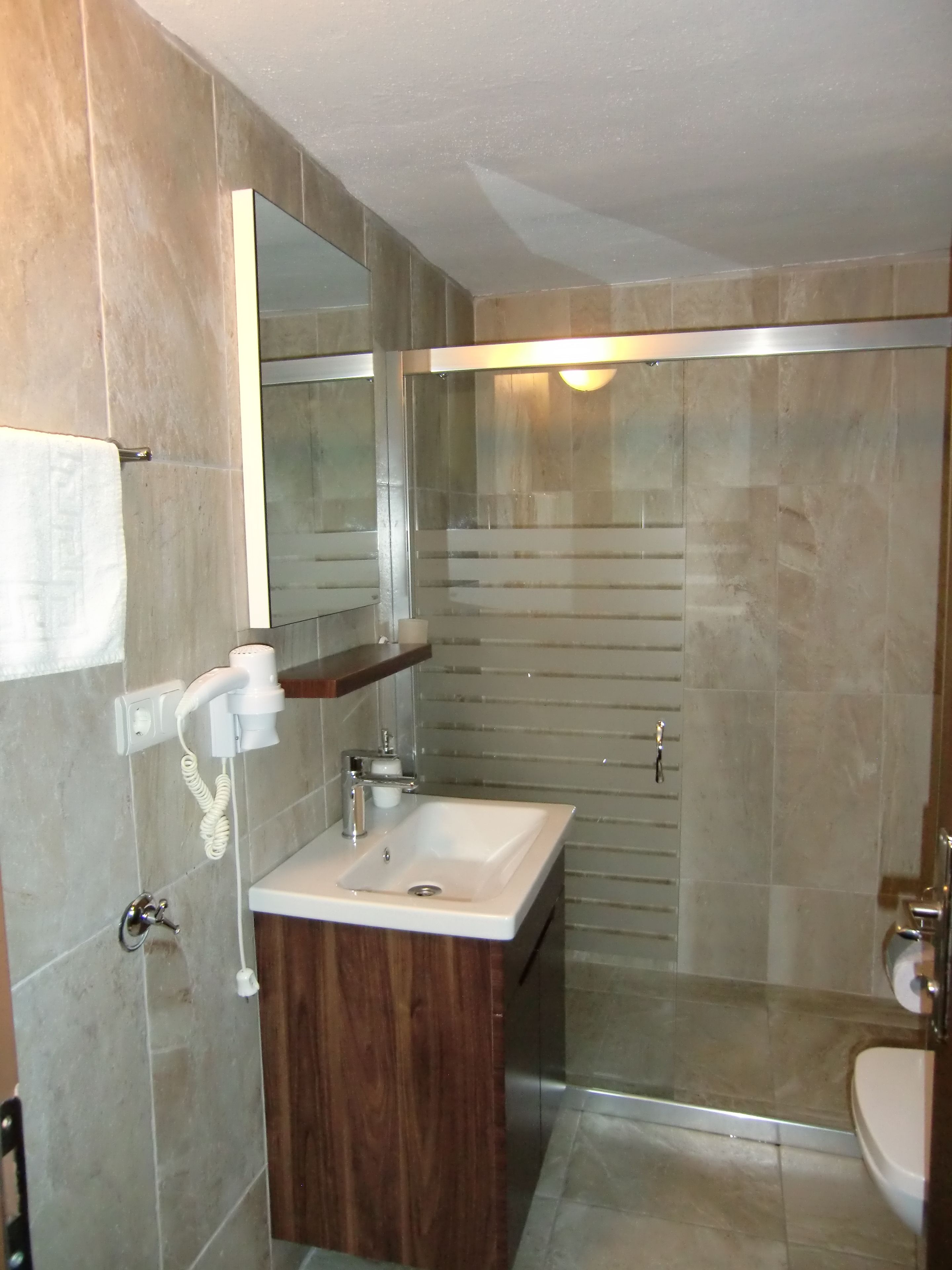 comfort room | bathroom | shower, free toiletries, hair dryer, slippers