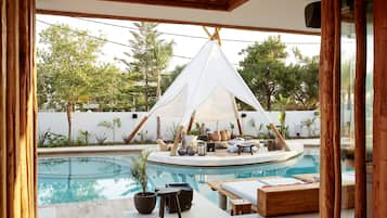 Seasonal outdoor pool, pool umbrellas, pool loungers