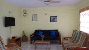 Apartment, 2 Bedrooms | Living room | Flat-screen TV