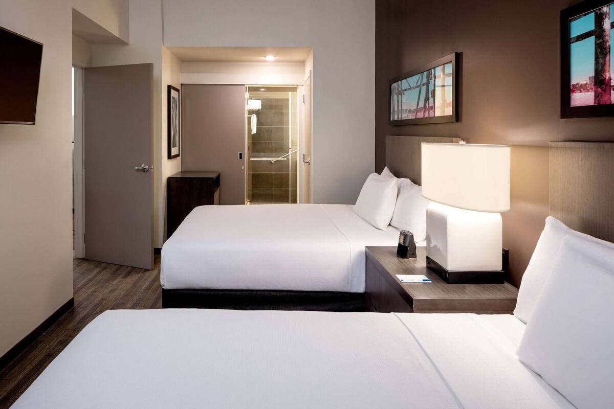 Hypo-allergenic bedding, down duvets, desk, blackout curtains