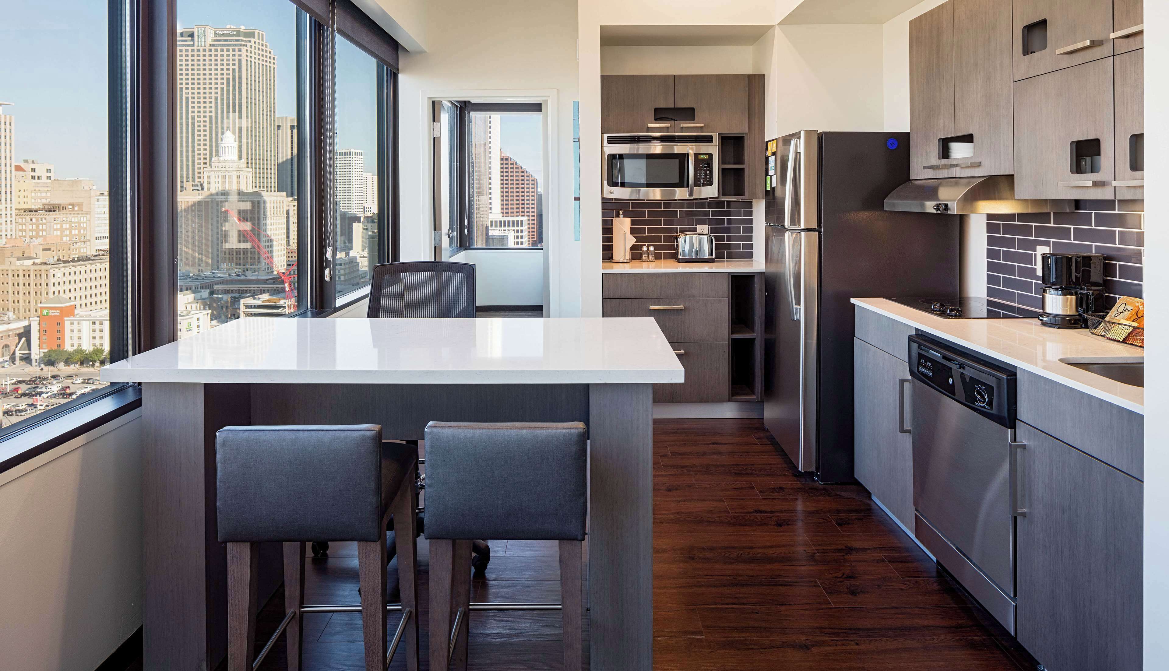 hypo-allergenic bedding, down duvets, desk, blackout curtains