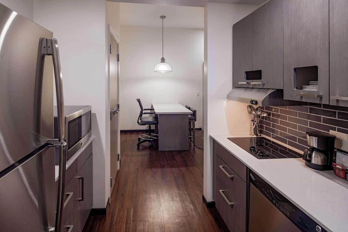 One Bedroom Suite One King | Hypo-allergenic bedding, down comforters, desk, blackout drapes