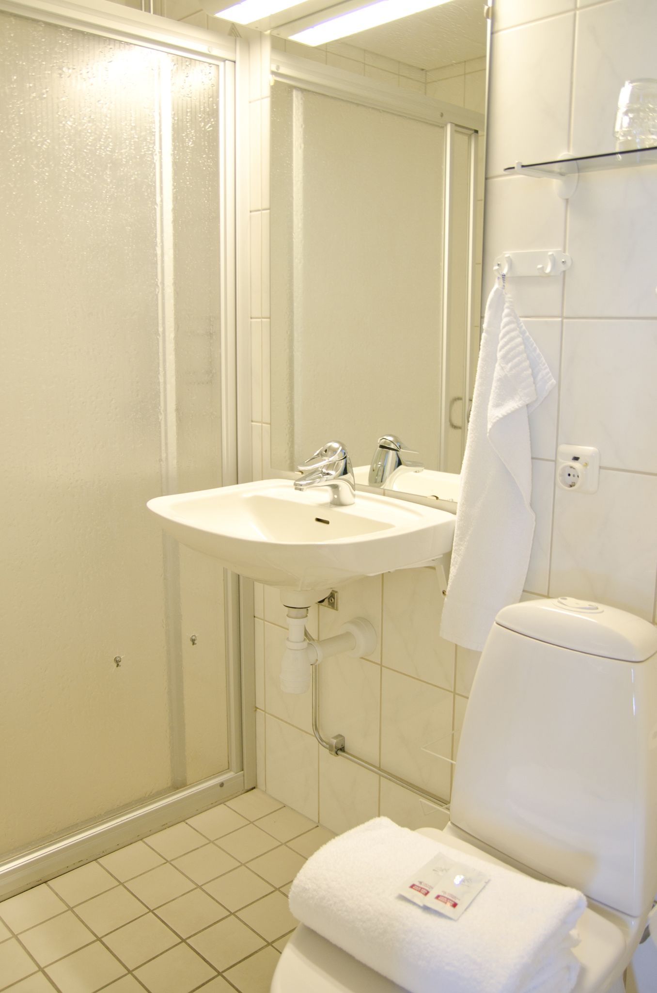 single room | bathroom | shower, hair dryer, towels