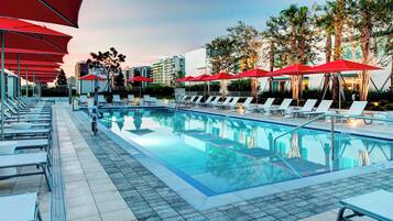 Outdoor pool, open 7:00 AM to 7:00 PM, pool cabanas (surcharge)