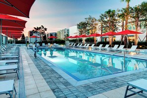 Outdoor pool, open 7:00 AM to 7:00 PM, pool cabanas (surcharge)
