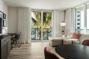 Suite, 1 Bedroom, Partial Ocean View | Down comforters, in-room safe, desk, laptop workspace