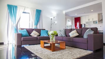 Apartment, 3 Bedrooms, Sea View | Living area | Flat-screen TV