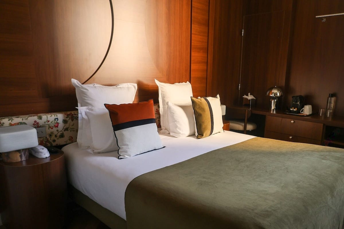 Classic Double Room, 1 Queen Bed, Courtyard View | In-room safe, individually decorated, individually furnished, desk