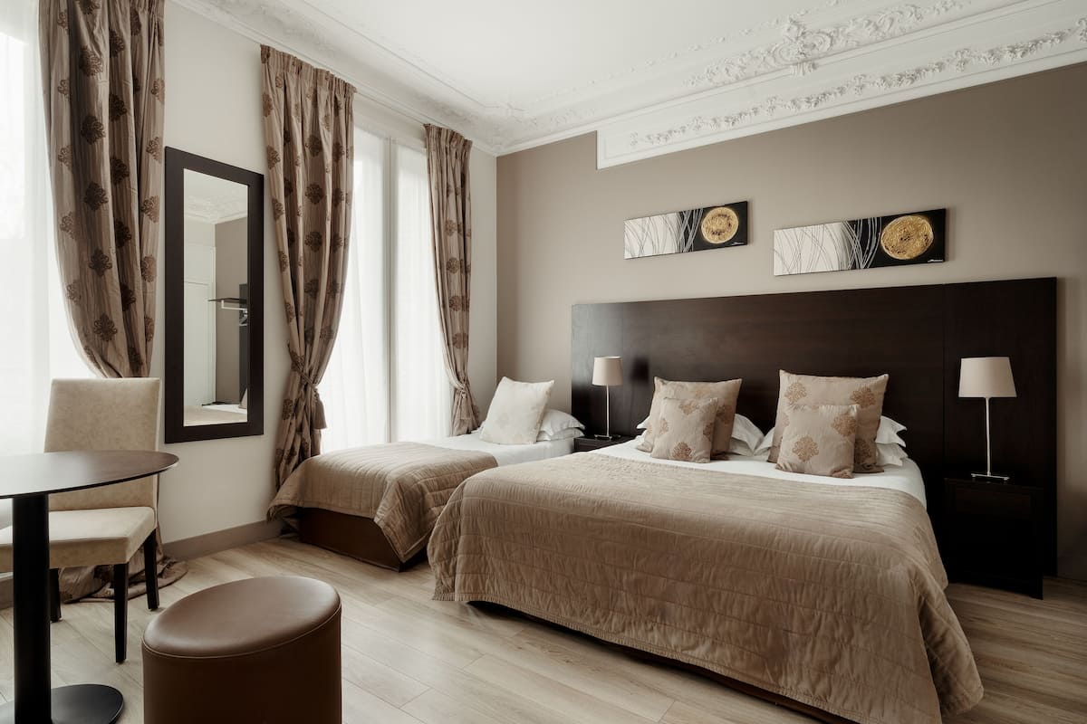 Family Room, Multiple Beds, Fireplace, City View | In-room safe, individually decorated, individually furnished, desk