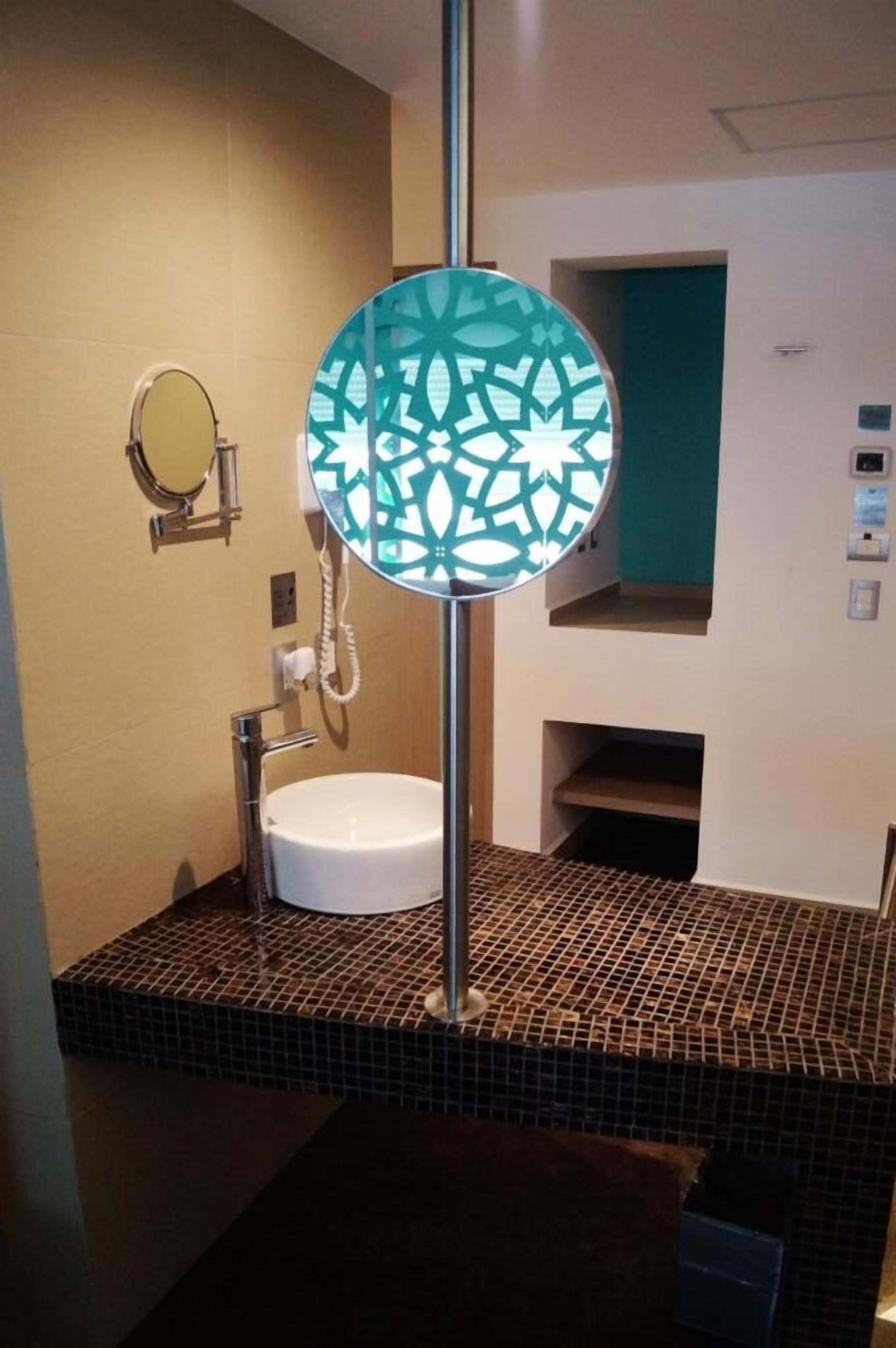 shiva suite with king bed and premium jacuzzi | bathroom | shower, free toiletries, hair dryer, towels