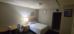 Desk, blackout curtains, free WiFi, bed sheets