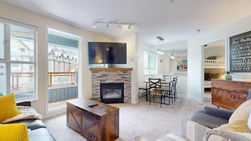 Luxury Suite, 2 Bedrooms (EL429) | Living area | Flat-screen TV, fireplace, DVD player