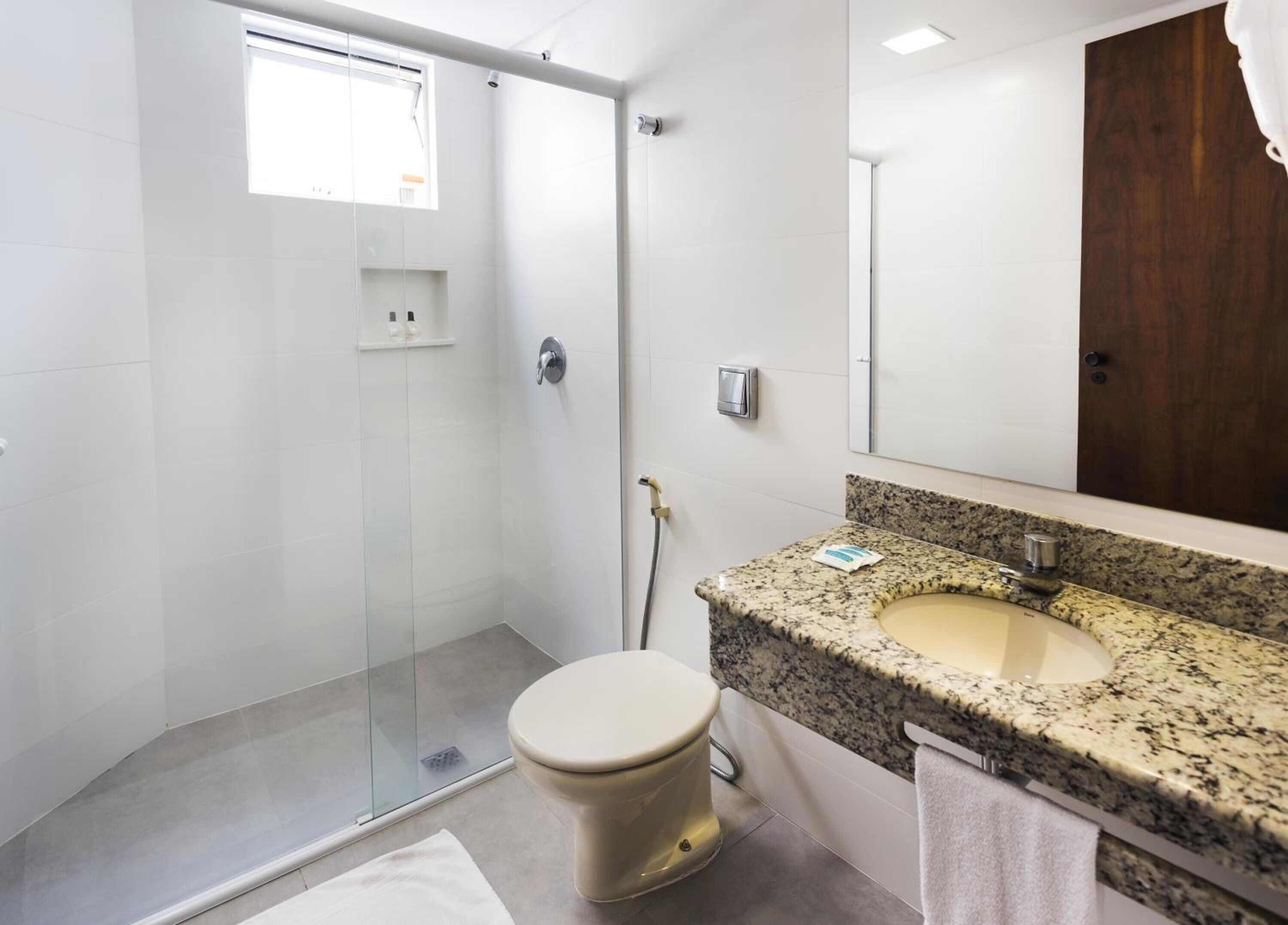 shower, free toiletries, hair dryer, towels