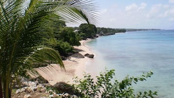 Beach nearby, white sand, sun loungers, beach umbrellas