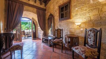 Superior Suite | Living area | Flat-screen TV