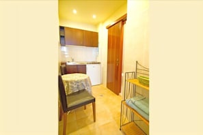 Superior Studio, City View | Private kitchen | Fridge
