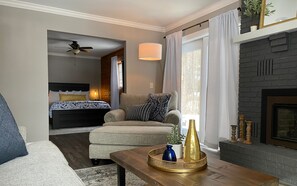 Still Waters | Living area | 40-inch TV with digital channels, books - Inn On Lake Wissota (Chippewa Falls)