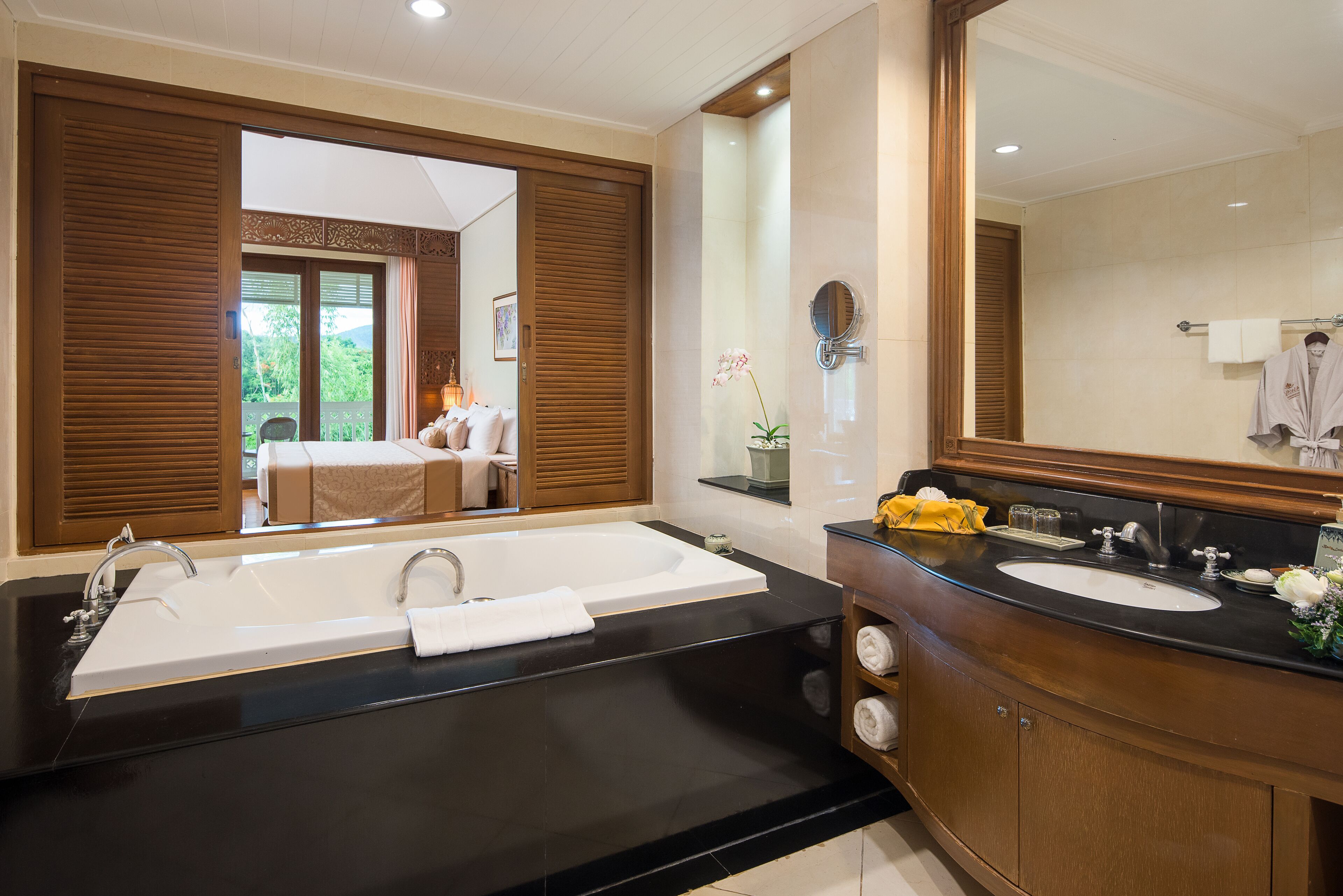 separate bathtub and shower, deep-soaking bathtub, rainfall showerhead