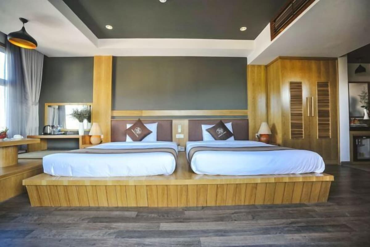 Een minibar, een kluis op de kamer, gratis wifi, beddengoed