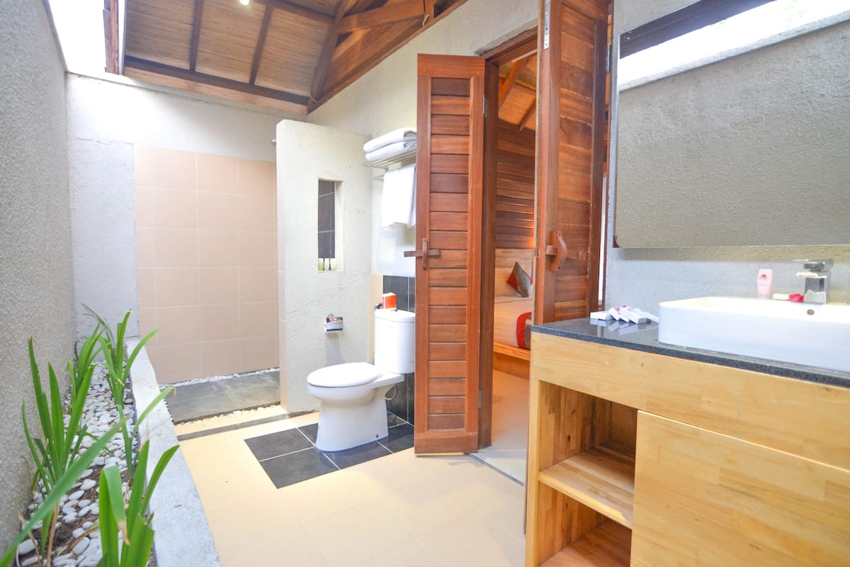 room, 1 bedroom, lagoon view | bathroom | shower, free toiletries, hair dryer, bathrobes