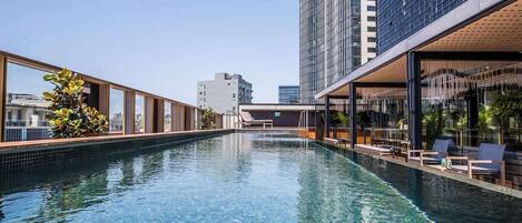 Outdoor pool, open 6:00 AM to 9:30 PM, sun loungers