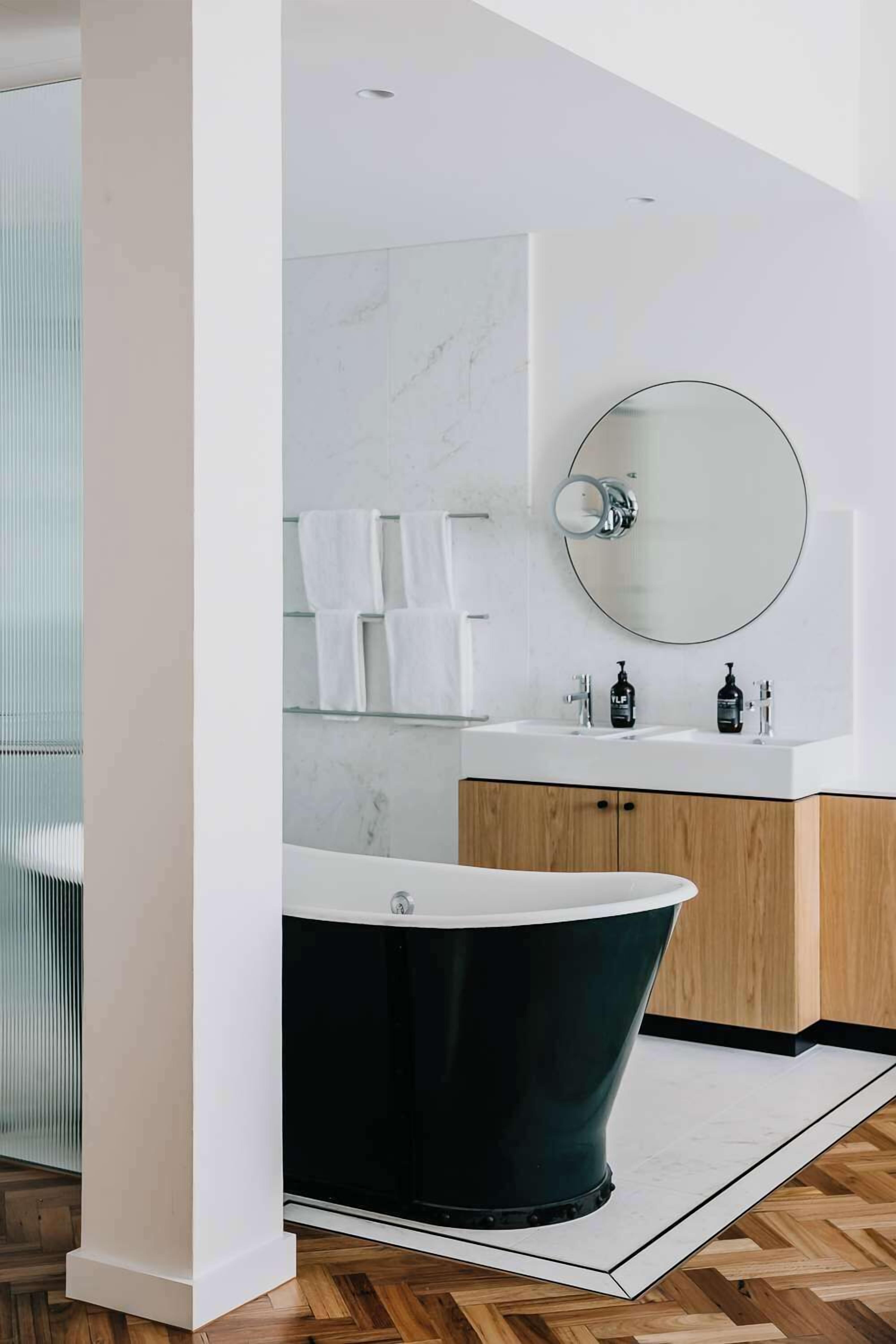 Designer toiletries, hair dryer, bathrobes, slippers