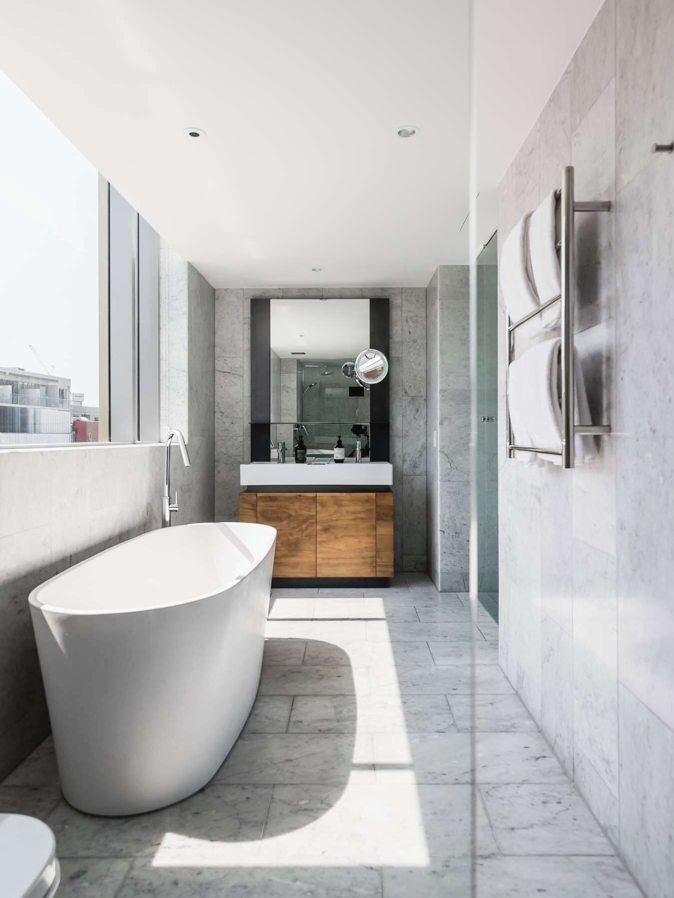 designer toiletries, hair dryer, bathrobes, slippers