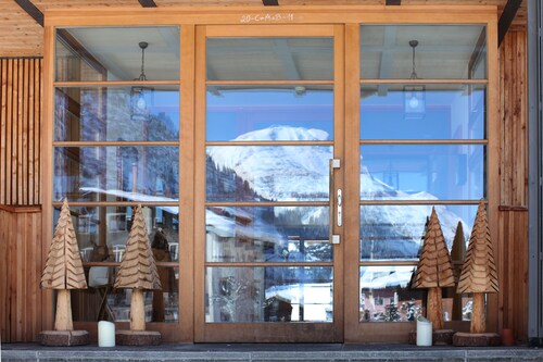 Alpina Lech Geborgen in den Bergen