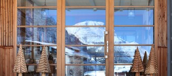 Alpina Lech Geborgen in den Bergen