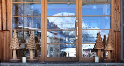 Alpina Lech Geborgen in den Bergen