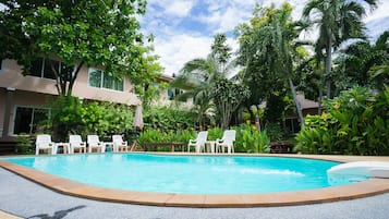 Outdoor pool, pool umbrellas, sun loungers