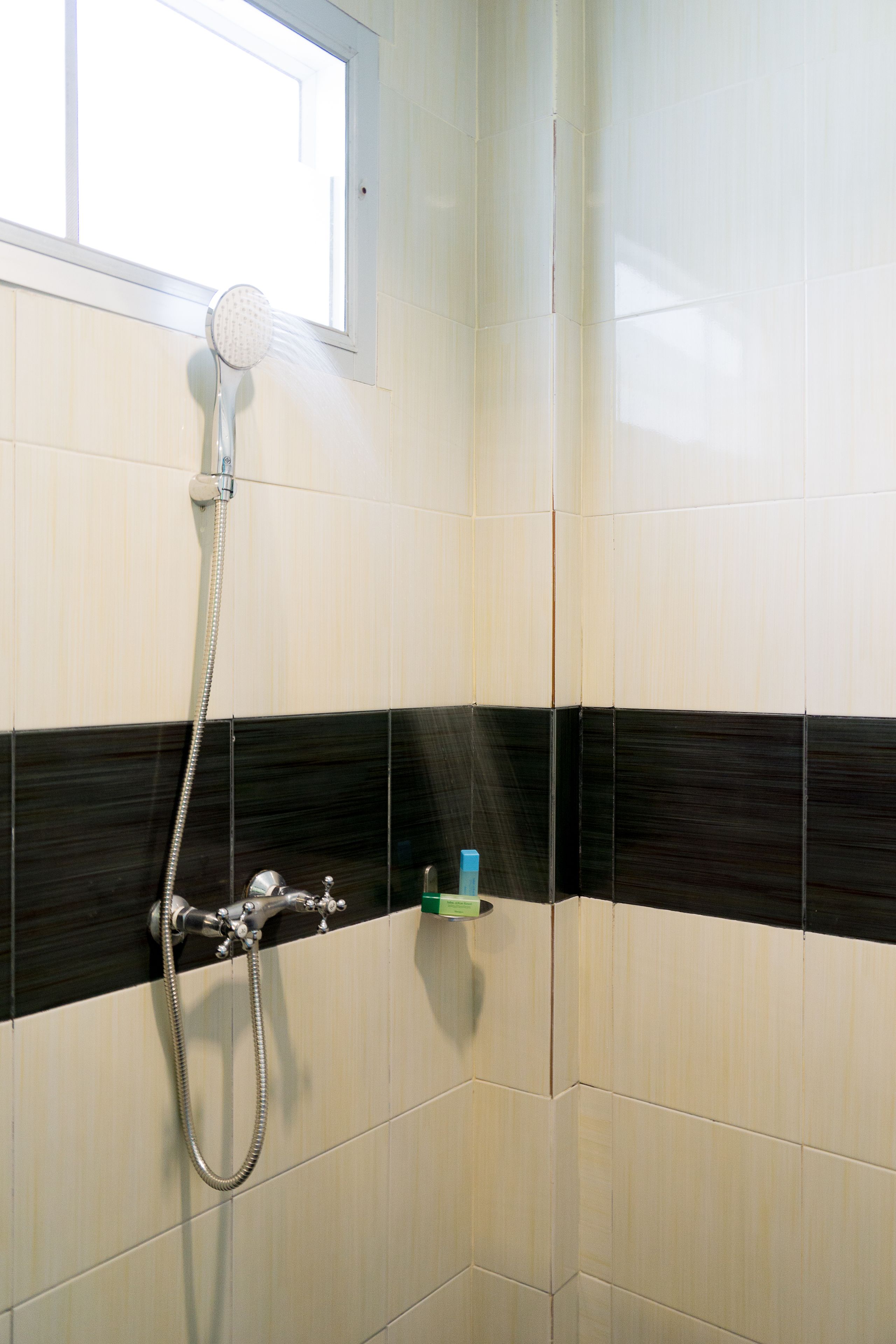 superior room | bathroom | shower, free toiletries, hair dryer, towels