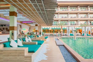 Outdoor pool, open 8:00 AM to 8:00 PM, free cabanas, pool umbrellas